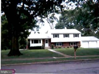 13 Bayberry Road Ewing, NJ 08618 - Photo 1 of 1 a front view of a house with a yard