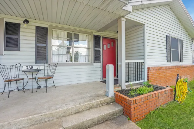 a front view of a house with a porch