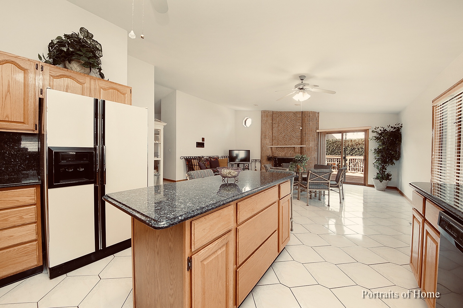 1220 Itasca Road Addison, IL 60101 - Photo 8 of 26 a kitchen with stainless steel appliances granite countertop a sink and cabinets