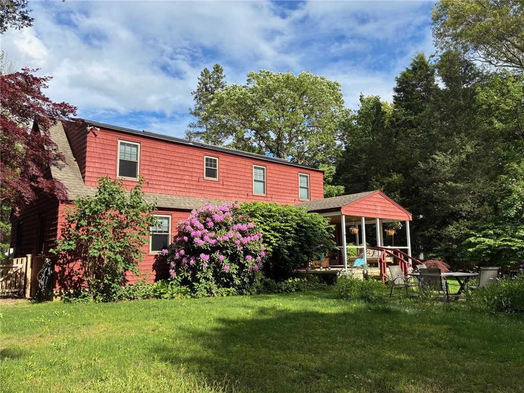 429 Howland Road East Greenwich, RI 02818 - Photo 13 of 33 Solar panels, patio, 2 driveways and more.