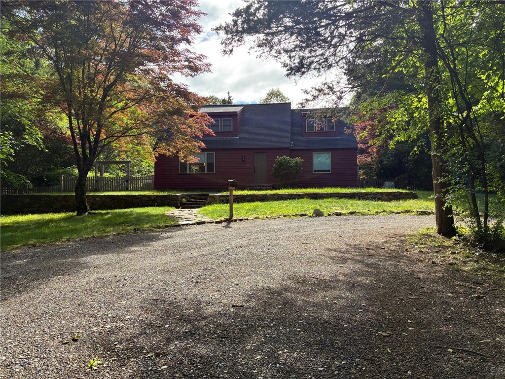 429 Howland Road East Greenwich, RI 02818 - Photo 19 of 33 Circular driveway in front of the house. Additional driveway at the back of the property with lots of parking for cars/RV's/boats and more.