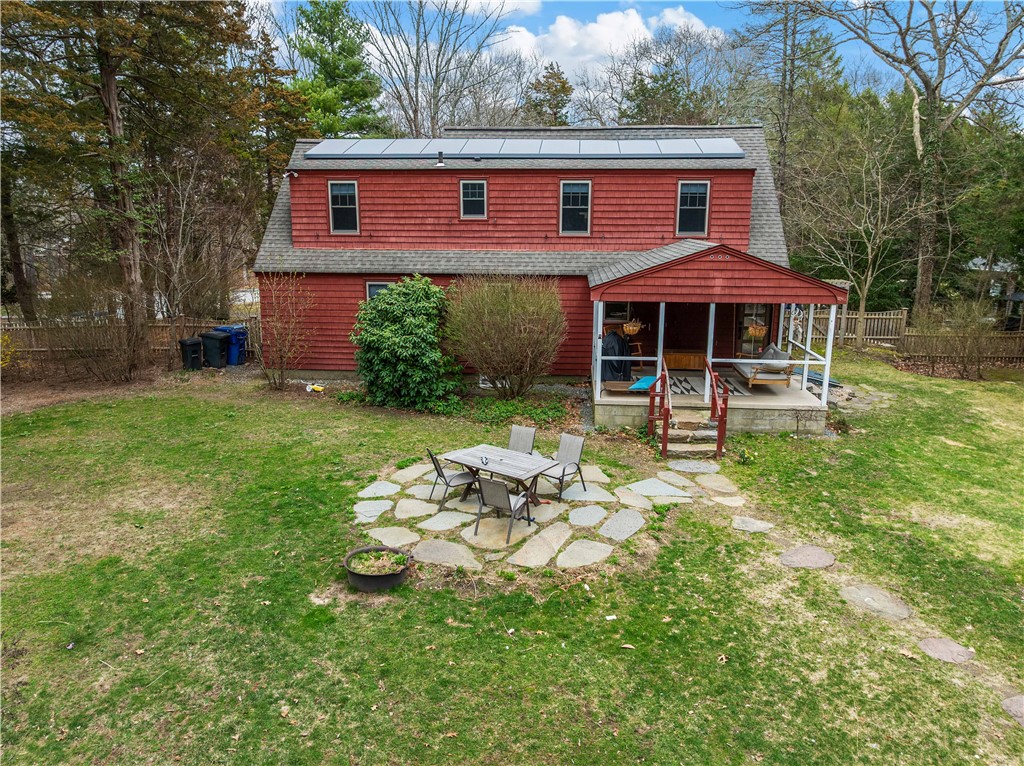 429 Howland Road East Greenwich, RI 02818 - Photo 31 of 33 Exterior Back with porch and patio