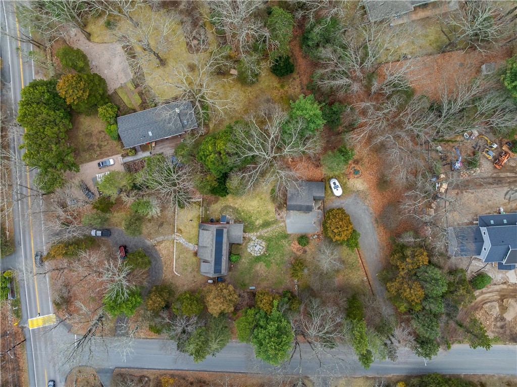 429 Howland Road East Greenwich, RI 02818 - Photo 32 of 33 Beautiful, large, wooded lot with fence. Two driveways means tons of parking.