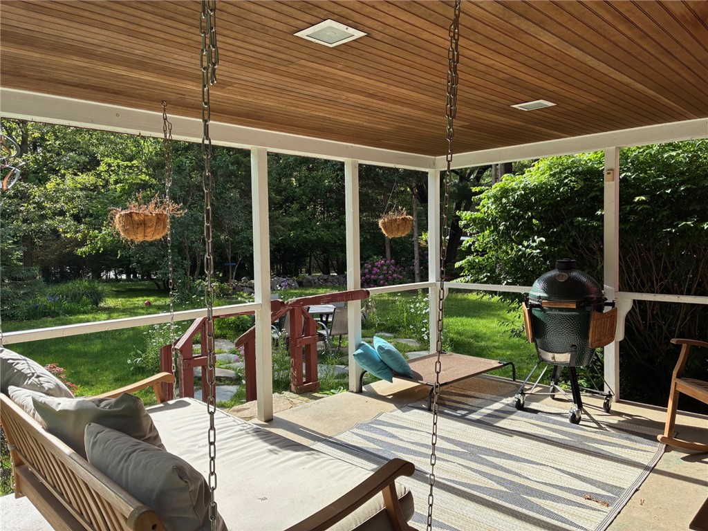 429 Howland Road East Greenwich, RI 02818 - Photo 9 of 33 Covered porch with Swing