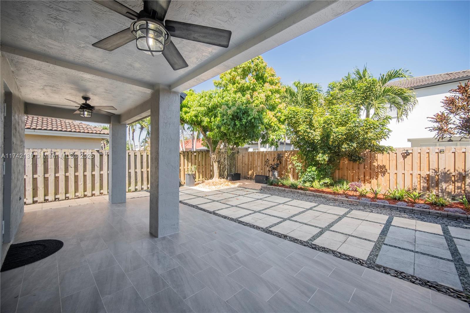 15929 Southwest 141st Terrace Miami, FL 33196 - Photo 23 of 41 a view of outdoor space and porch
