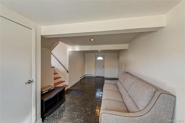 a bathroom with a sink toilet and mirror