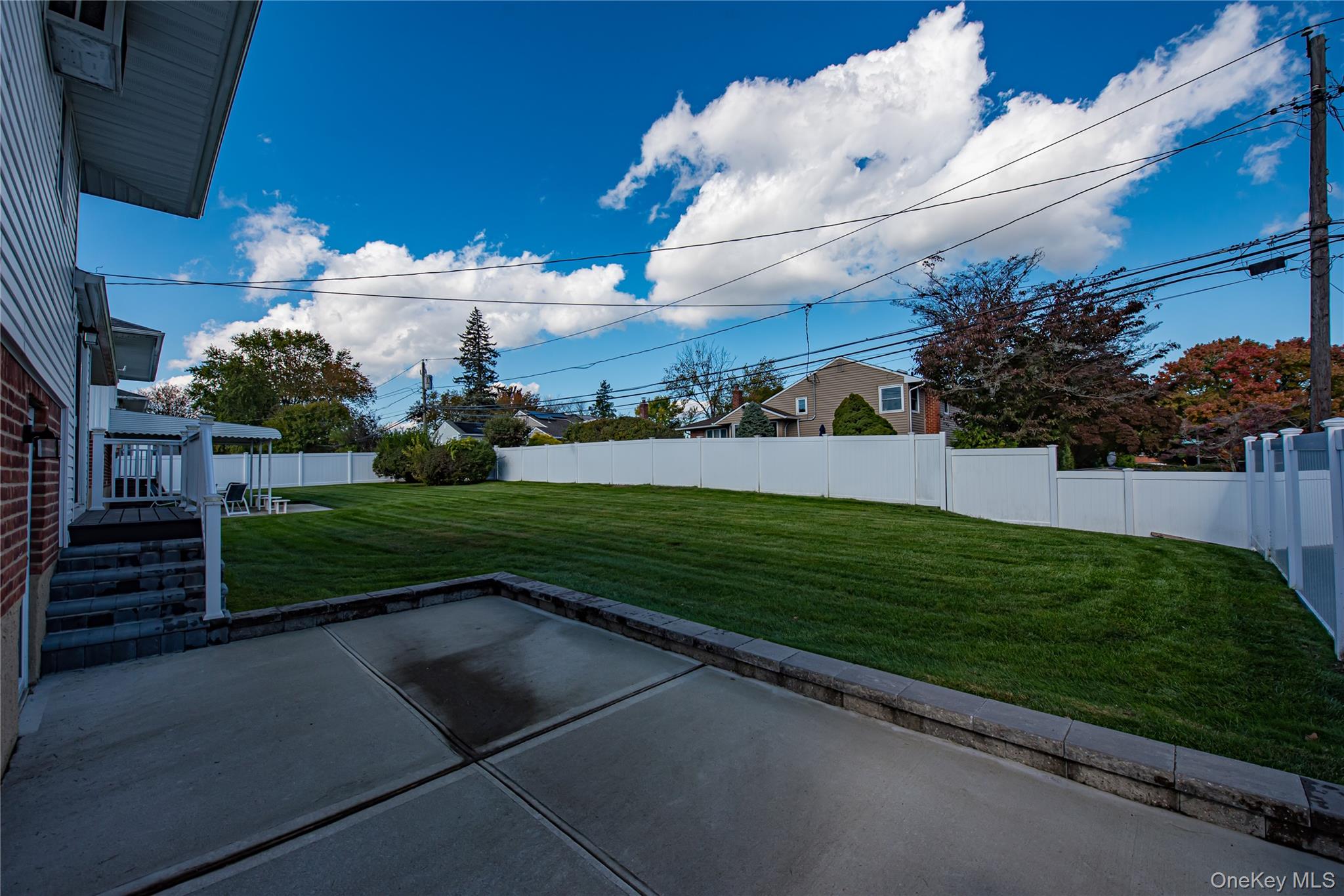 49 Spector Lane Plainview, NY 11803 - Photo 18 of 20 a view of a back yard