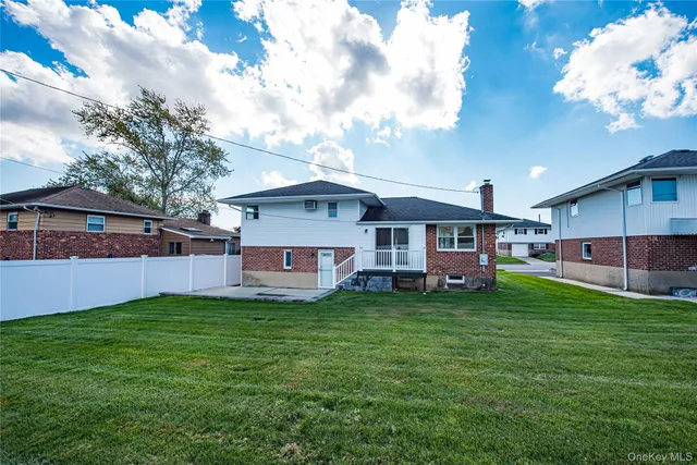 a view of a pathway besides a house