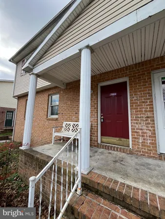 a view of front of house with stairs
