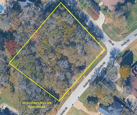 a view of swimming pool with a yard