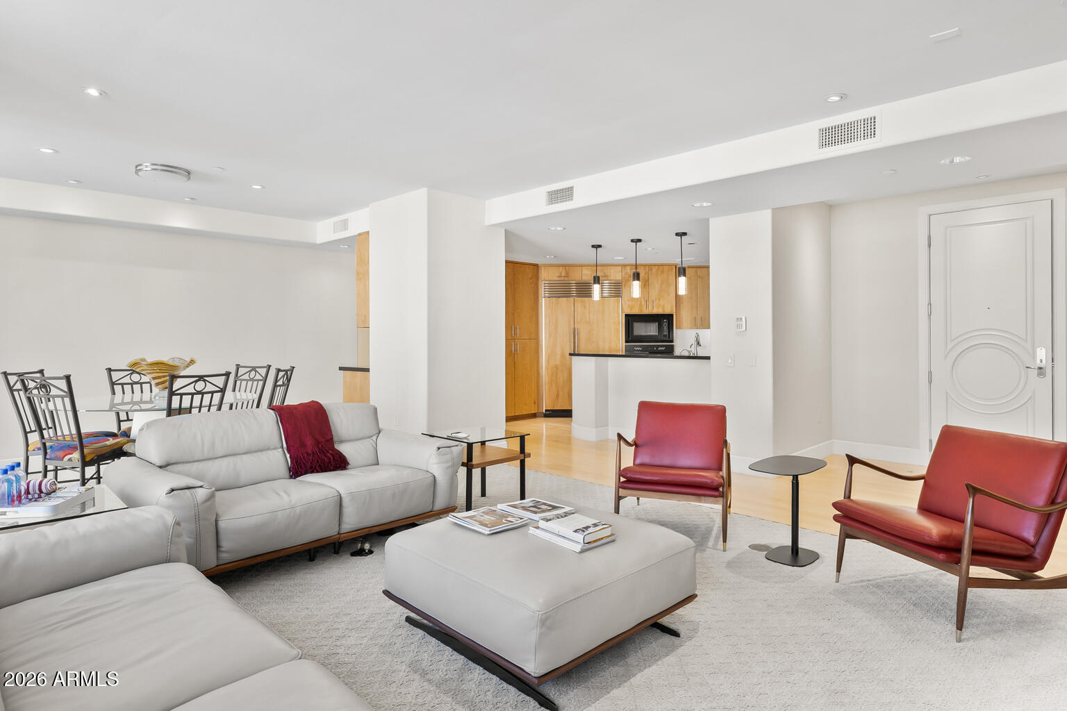 2402 East Esplanade Lane, Unit 704 Phoenix, AZ 85016 - Photo 11 of 42 a living room with furniture and a couch