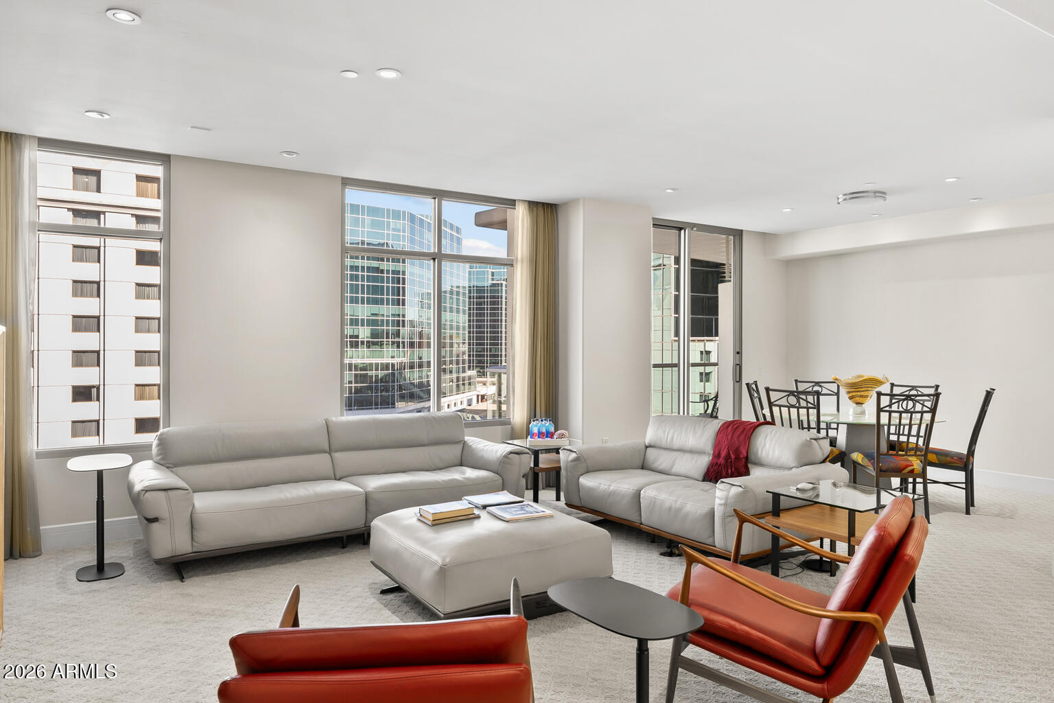 2402 East Esplanade Lane, Unit 704 Phoenix, AZ 85016 - Photo 2 of 42 a living room with furniture and a large window