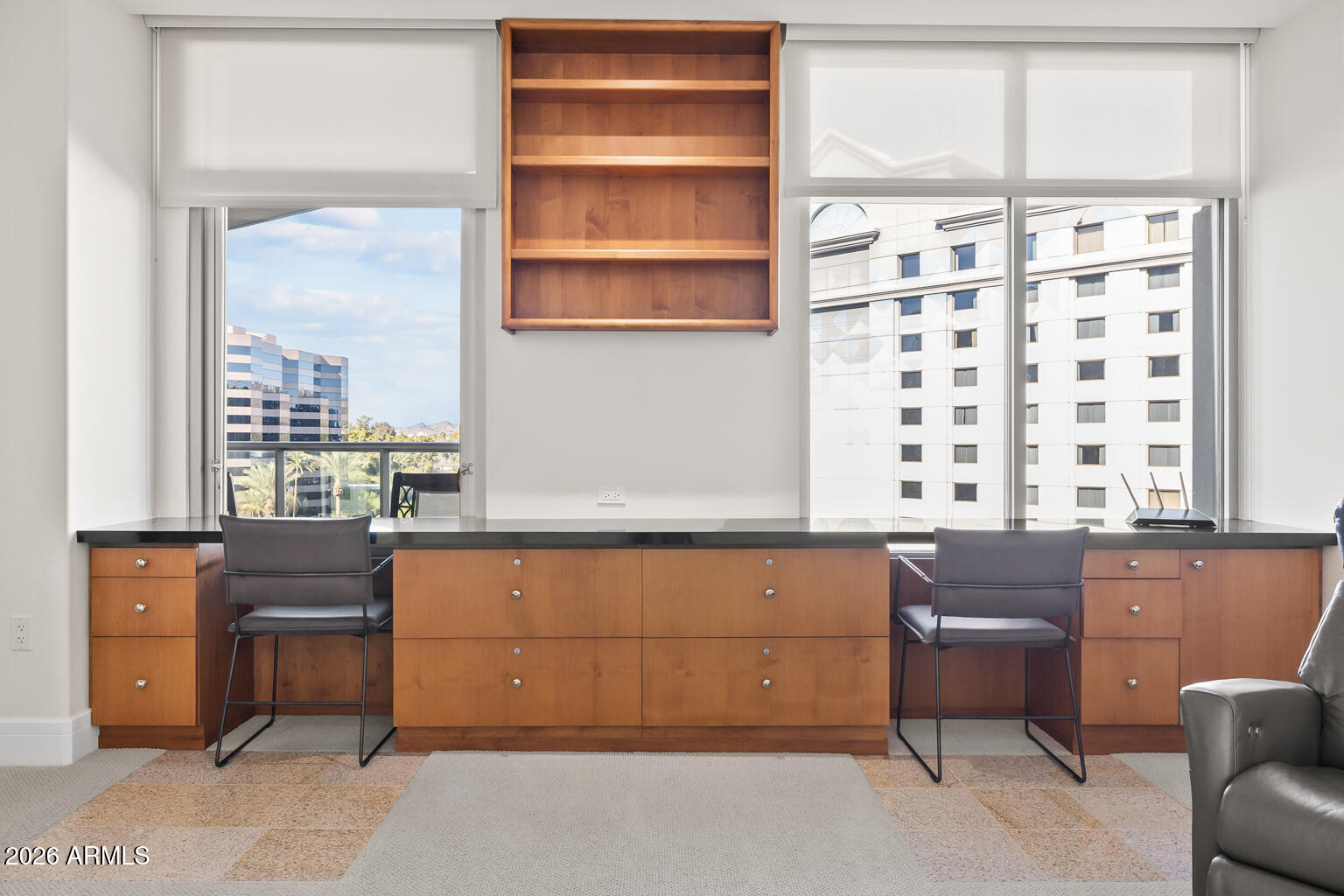 2402 East Esplanade Lane, Unit 704 Phoenix, AZ 85016 - Photo 25 of 42 a room with a window and furniture