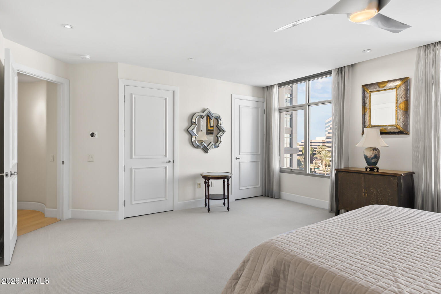 2402 East Esplanade Lane, Unit 704 Phoenix, AZ 85016 - Photo 31 of 42 a bedroom with a bed and a window