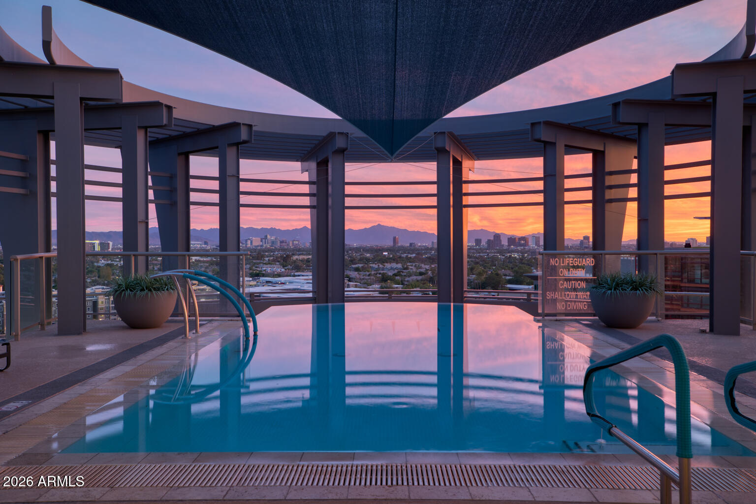 2402 East Esplanade Lane, Unit 704 Phoenix, AZ 85016 - Photo 5 of 42 a view of a porch and wooden floor