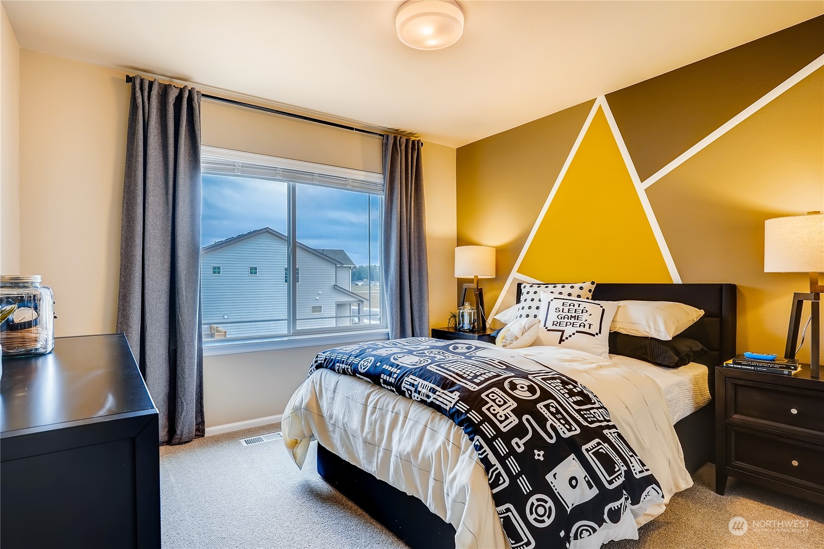 23422 41st Drive Southeast, Unit 61 Bothell, WA 98021 - Photo 6 of 24 a bedroom with a bed and a window