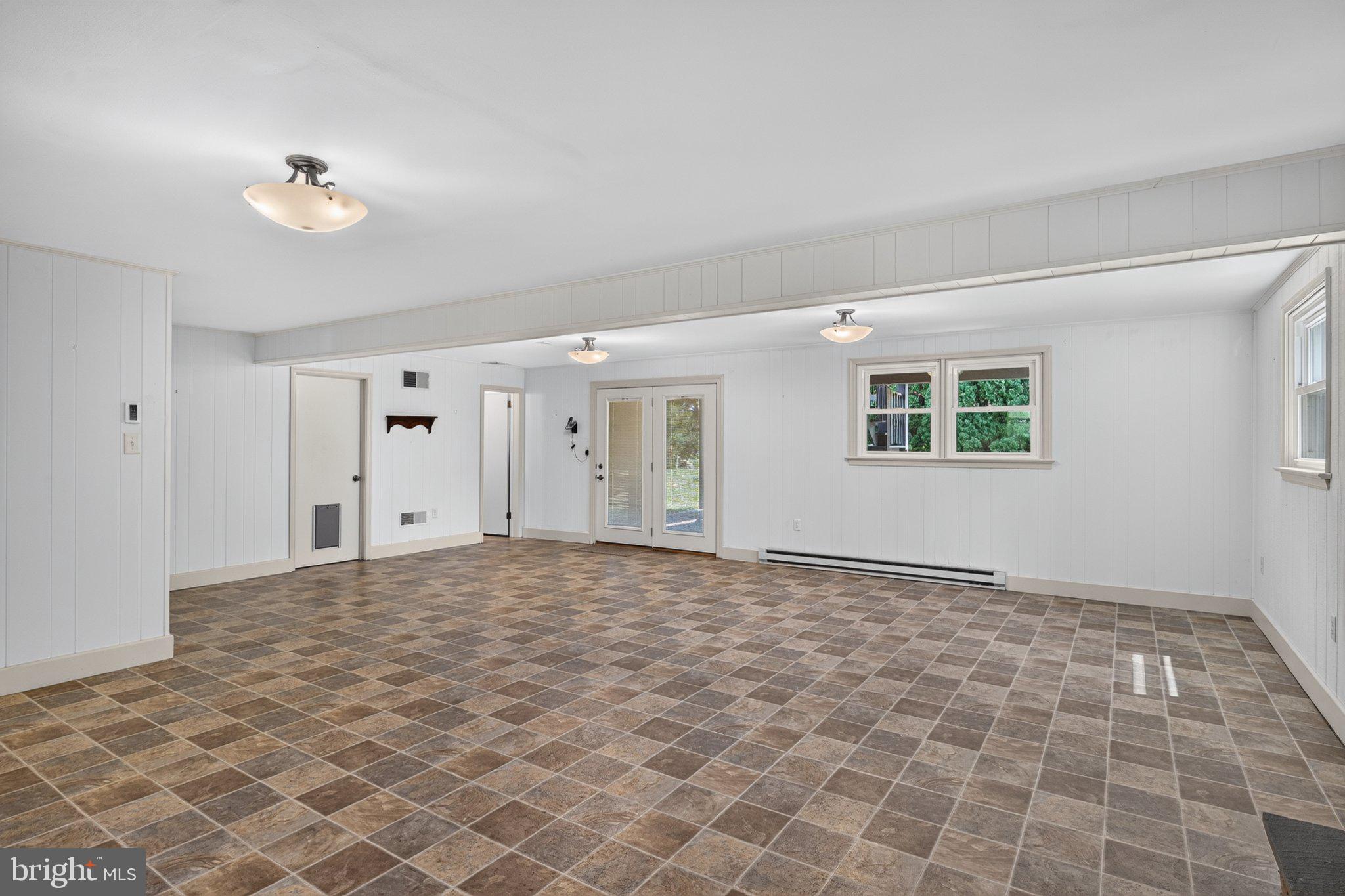 1277 South Colebrook Road Manheim, PA 17545 - Photo 28 of 65 Spacious, light-filled living area.