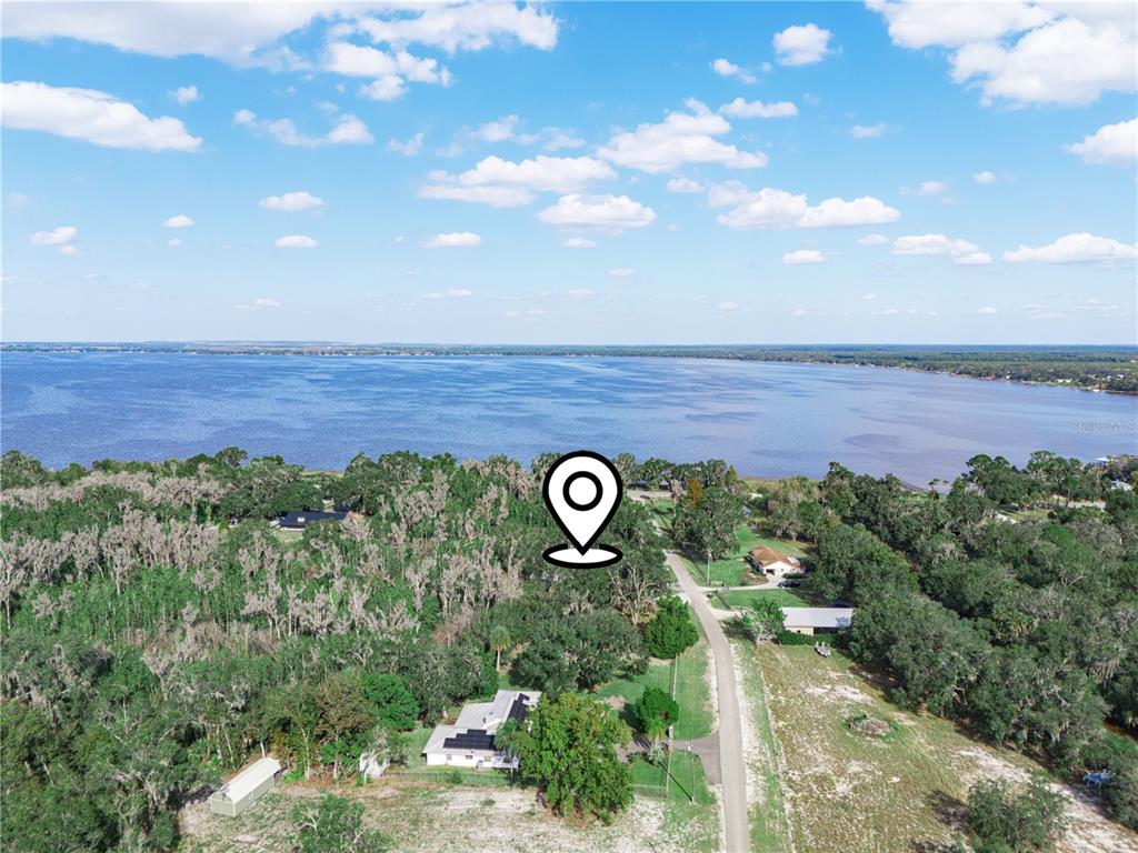 100 Reedy Creek Drive Frostproof, FL 33843 - Photo 2 of 36 a view of outdoor space with city view