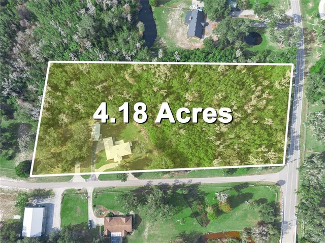 a view of a lake from a yard