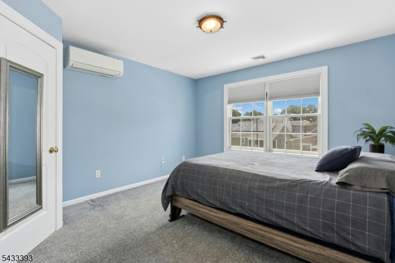 33 Stanton Street Clark, NJ 07066 - Photo 27 of 37 a bedroom with a bed and a window