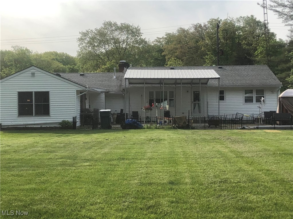 379 Wilson Mills Road Chardon, OH 44024 - Photo 20 of 20 Back of property featuring a chimney and a shingled roof