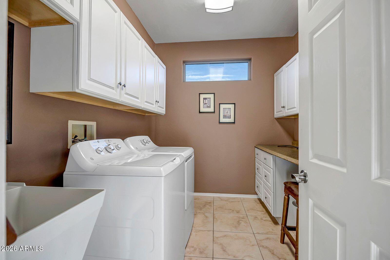 19848 North Rawhide Way Surprise, AZ 85387 - Photo 31 of 61 a utility room with dryer and washer