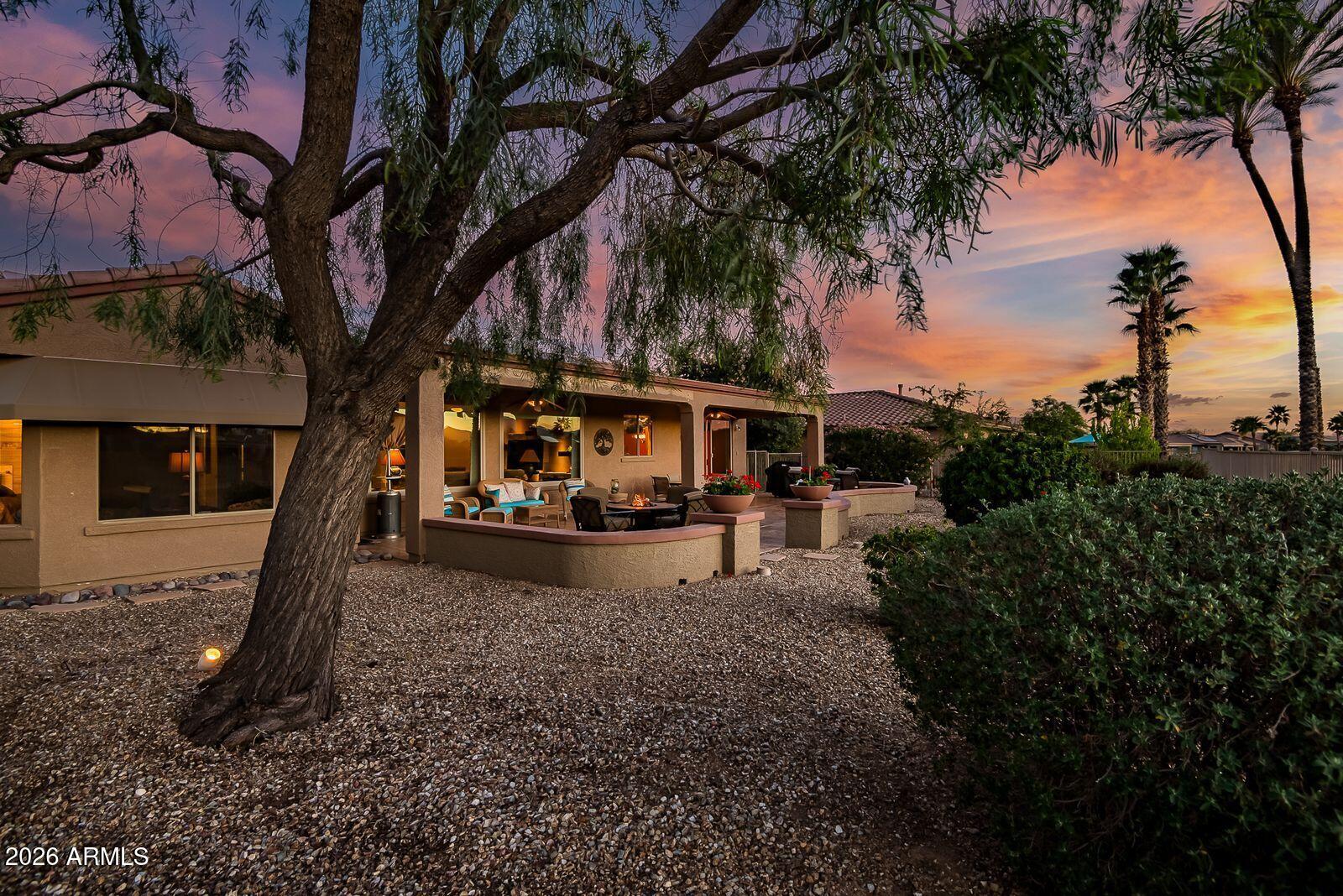 19848 North Rawhide Way Surprise, AZ 85387 - Photo 44 of 61 a view of a house with backyard and tree