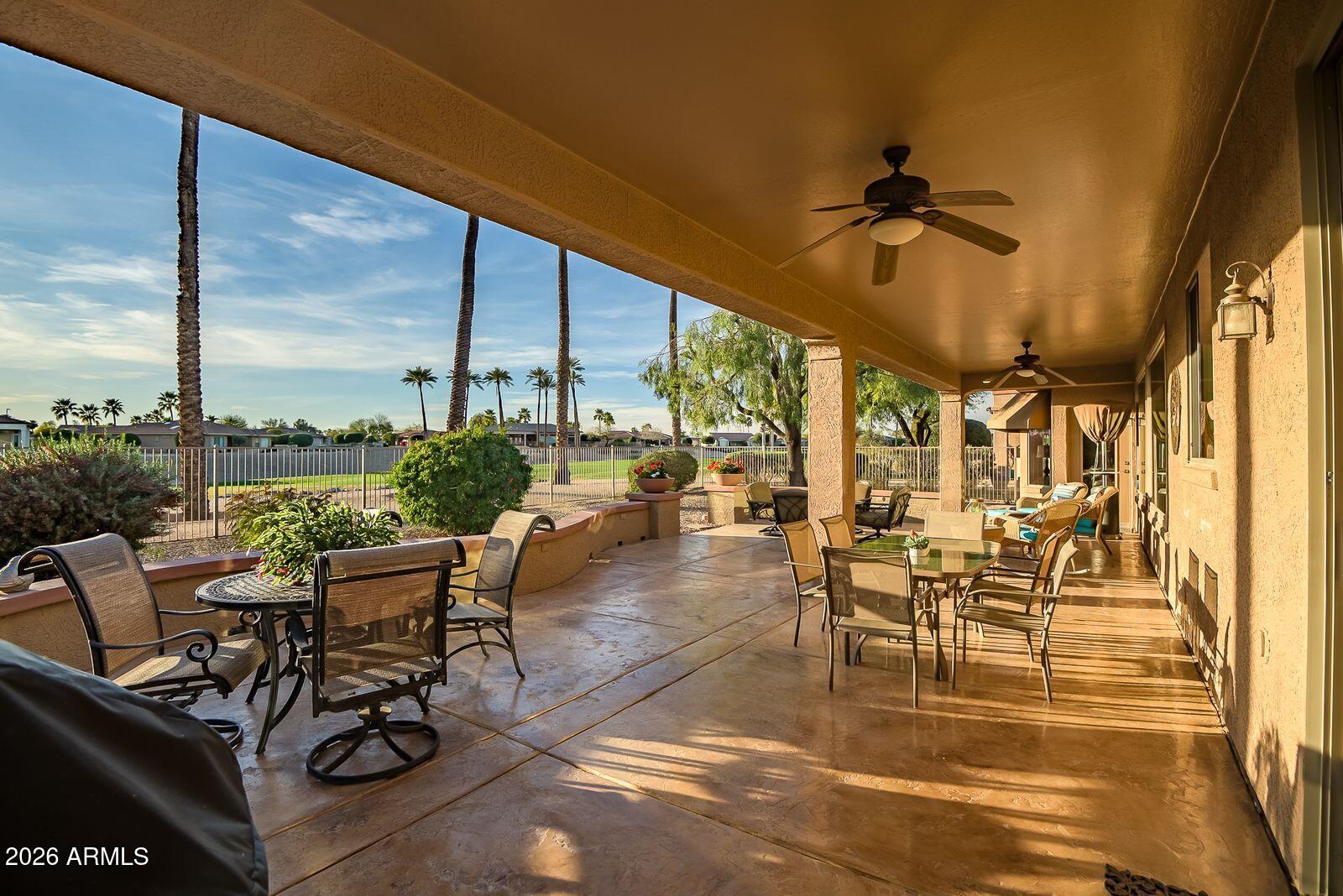 19848 North Rawhide Way Surprise, AZ 85387 - Photo 47 of 61 a view of a patio with table and chairs
