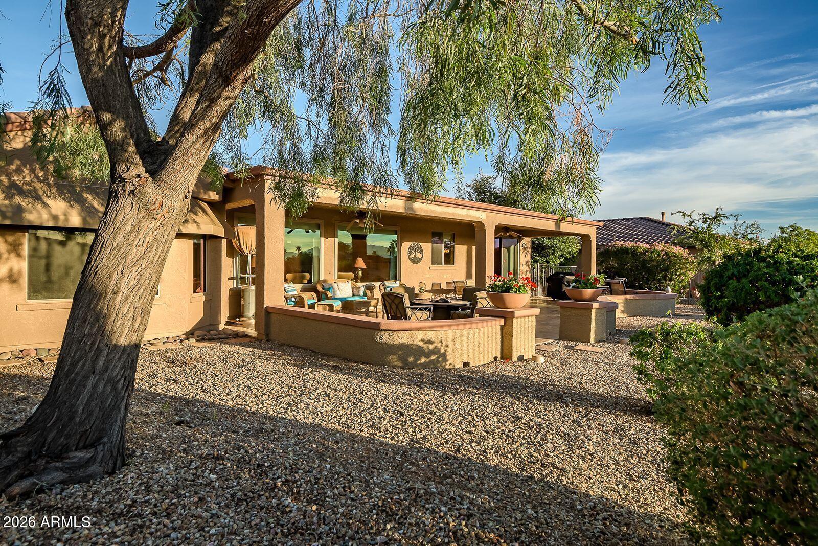 19848 North Rawhide Way Surprise, AZ 85387 - Photo 51 of 61 a view of a yard with tree s