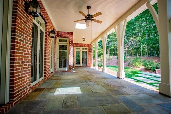 a view of a porch with a yard