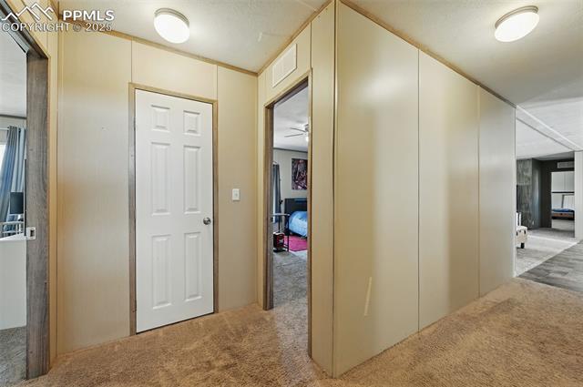 30890 Ken View Yoder, CO 80864 - Photo 7 of 18 Hall featuring light carpet