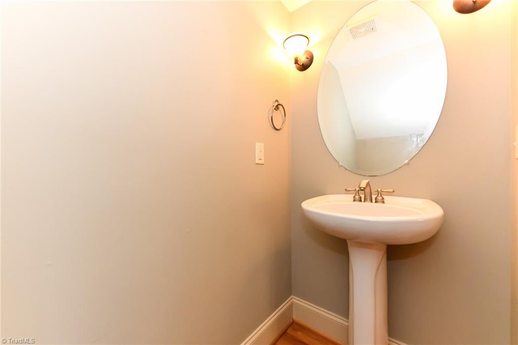 5718 Mabe Drive Oak Ridge, NC 27310 - Photo 14 of 39 Powder Room