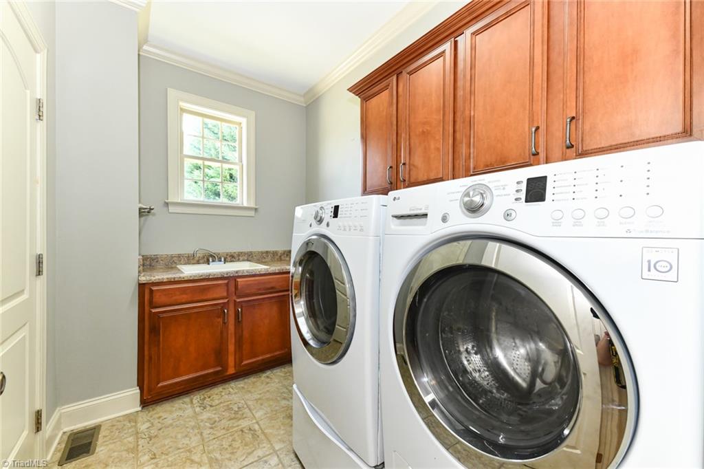 5718 Mabe Drive Oak Ridge, NC 27310 - Photo 15 of 39 Laundry Room