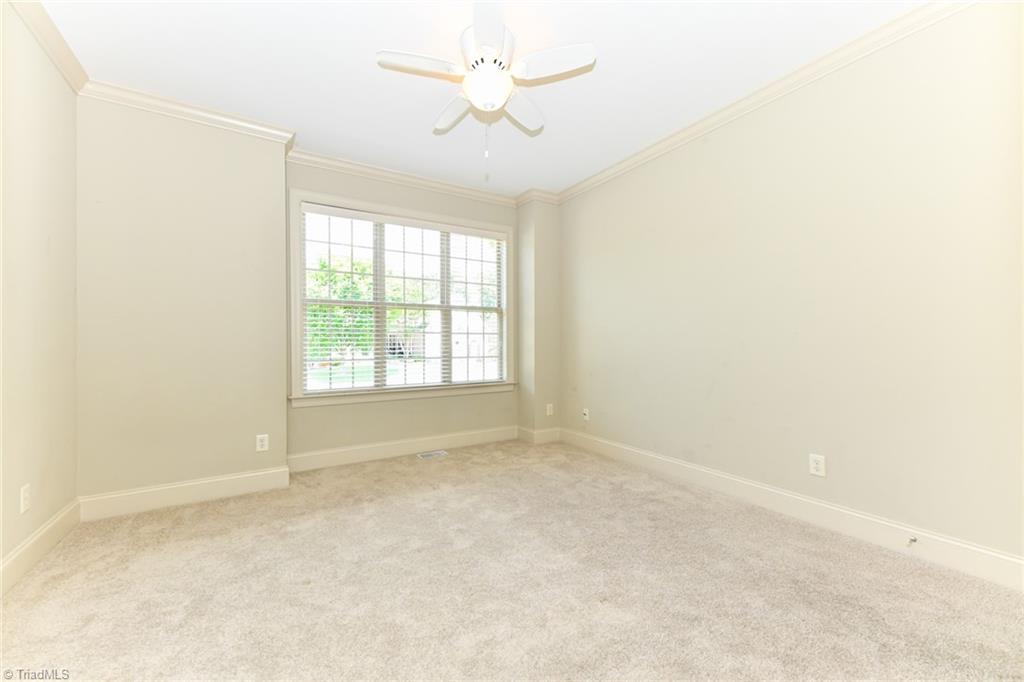 5718 Mabe Drive Oak Ridge, NC 27310 - Photo 23 of 39 Bedroom 2