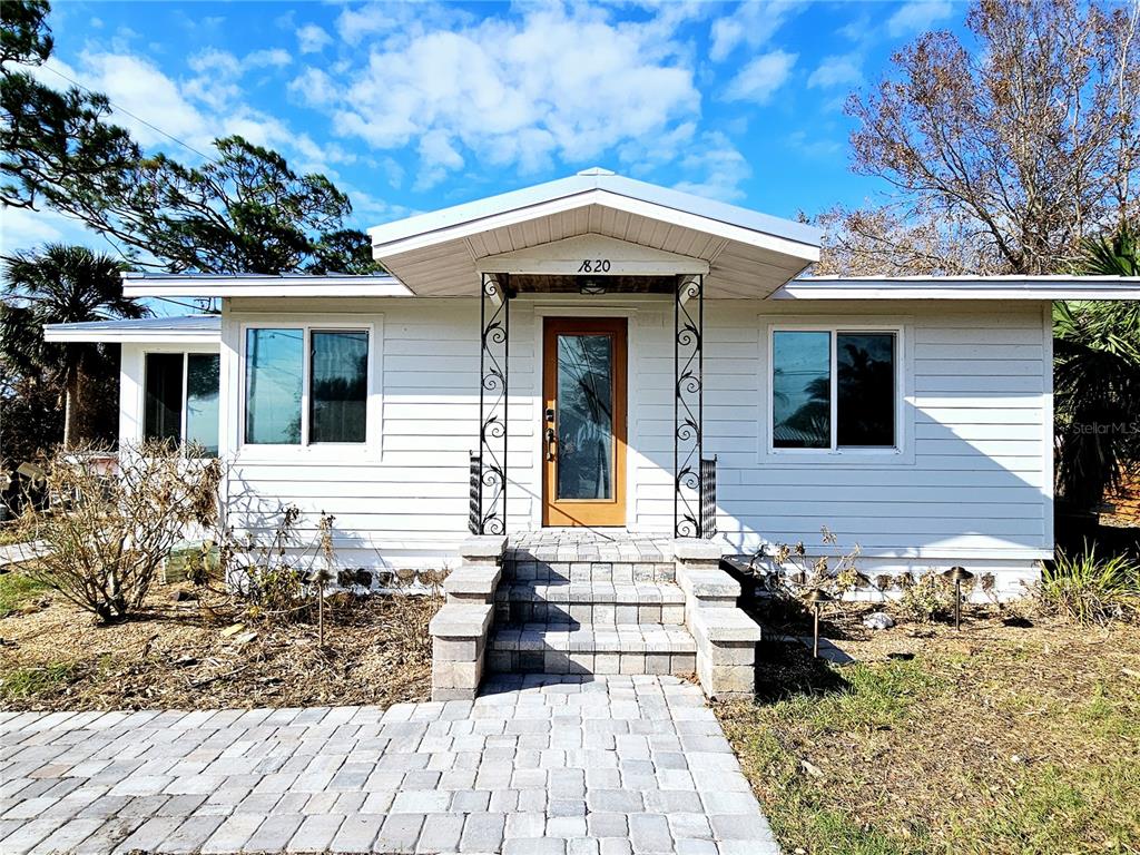 1820 New Point Comfort Road Englewood, FL 34223 - Photo 1 of 1 Front of cottage