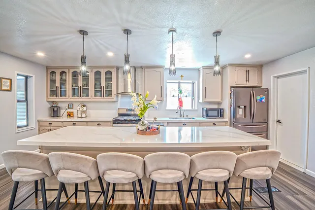 a view of livingroom and dining room with wooden floor