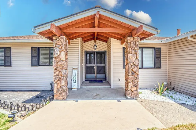 a view of a living room with a mirror