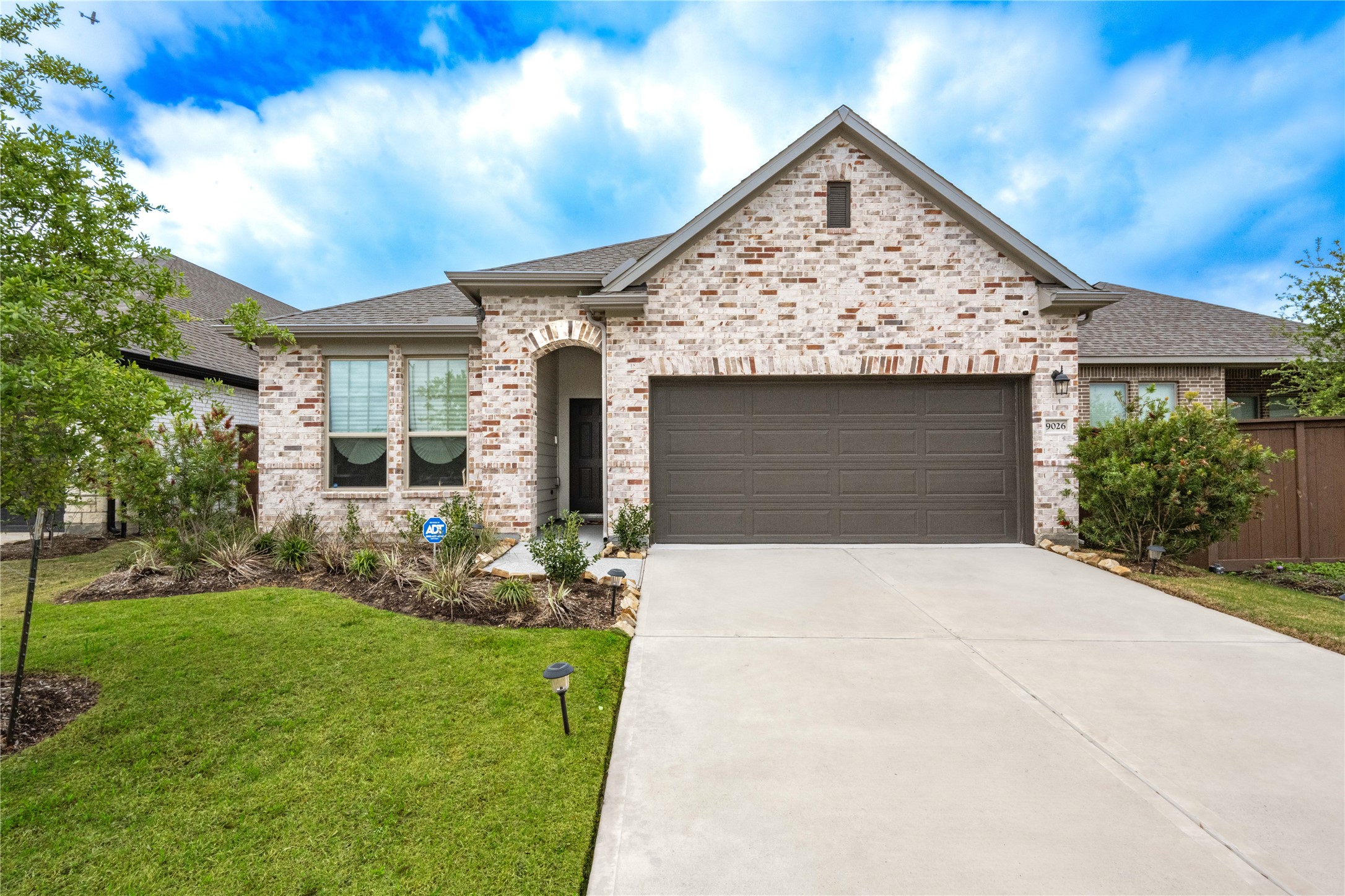 9026 Red Wolf Place Manvel, TX 77578 - Photo 1 of 17 a view of house with garden