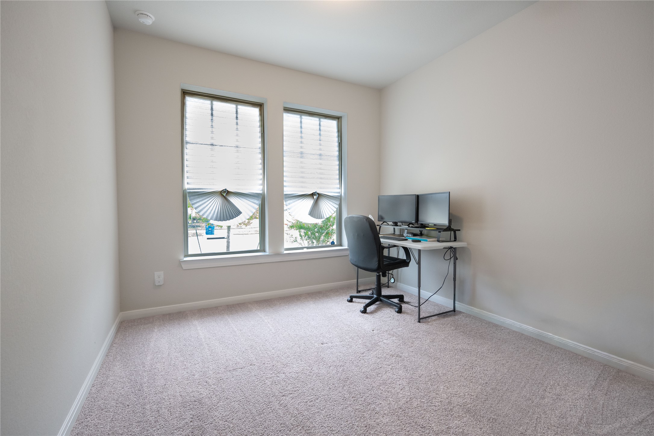 9026 Red Wolf Place Manvel, TX 77578 - Photo 13 of 17 a view of a workspace with a window