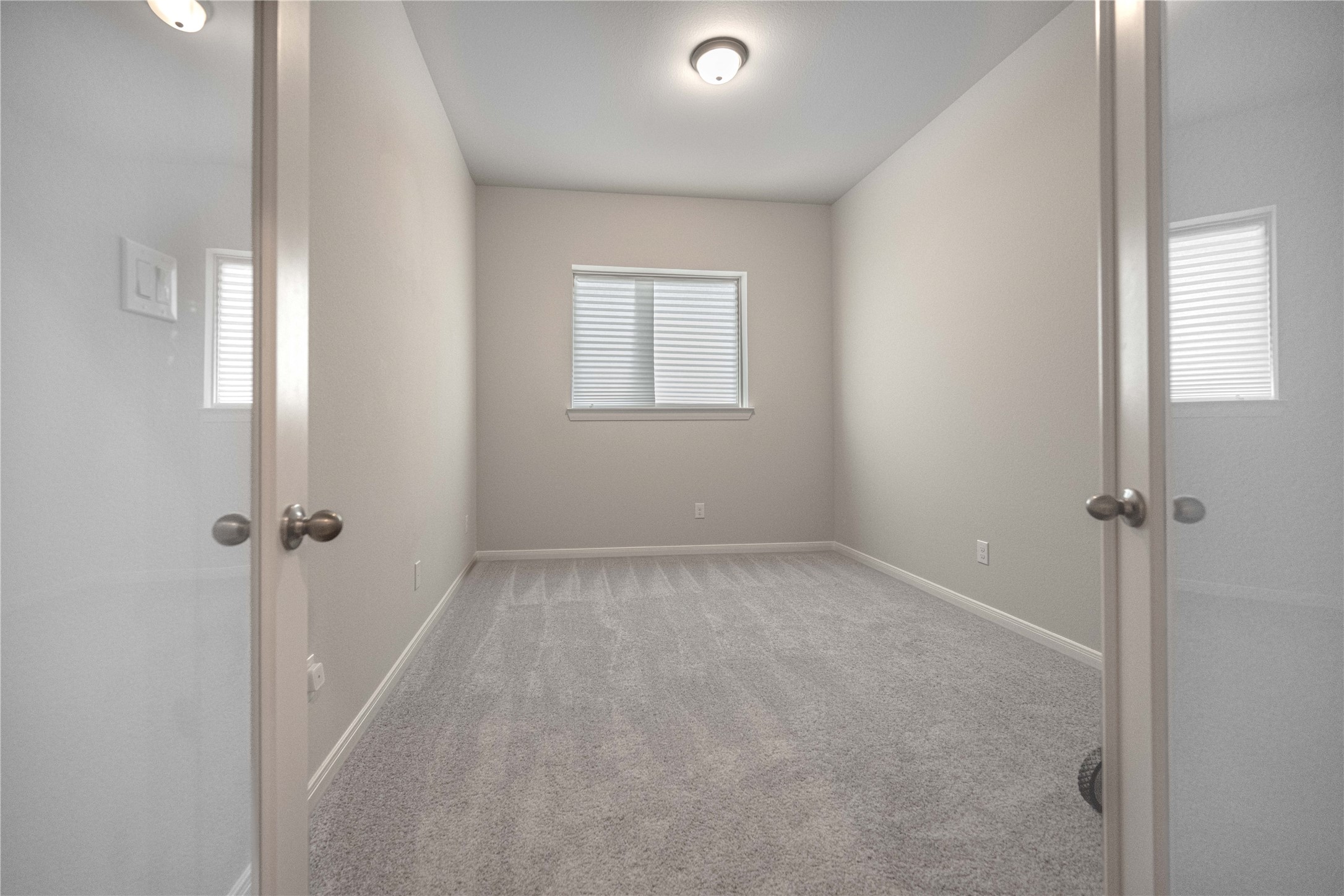 9026 Red Wolf Place Manvel, TX 77578 - Photo 2 of 17 a view of an empty room with a window
