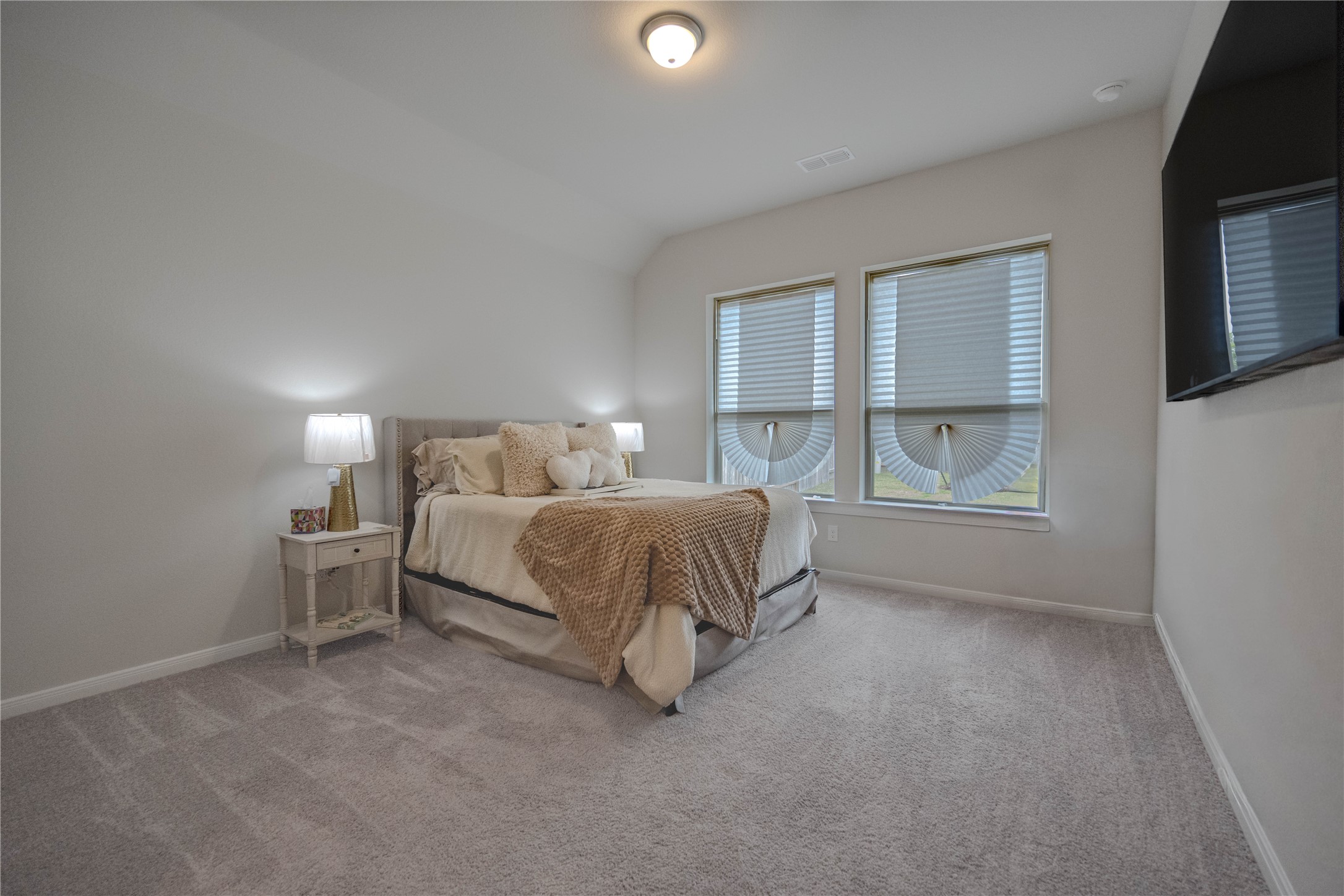 9026 Red Wolf Place Manvel, TX 77578 - Photo 9 of 17 a bedroom with a bed and a window