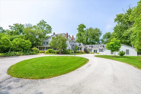 a view of a yard with a trees