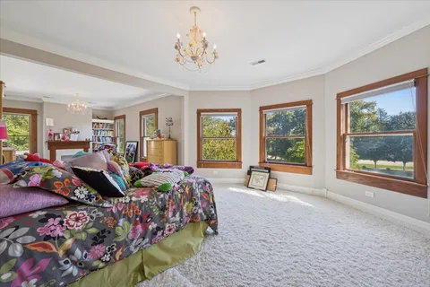 a bathroom with a shower and a glass door