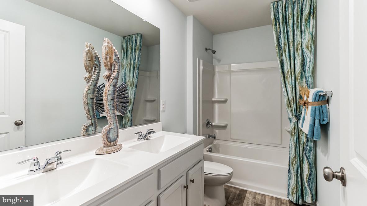 10 Moro Road Egg Harbor Township, NJ 08234 - Photo 20 of 42 a bathroom with a sink a toilet a tub and shower