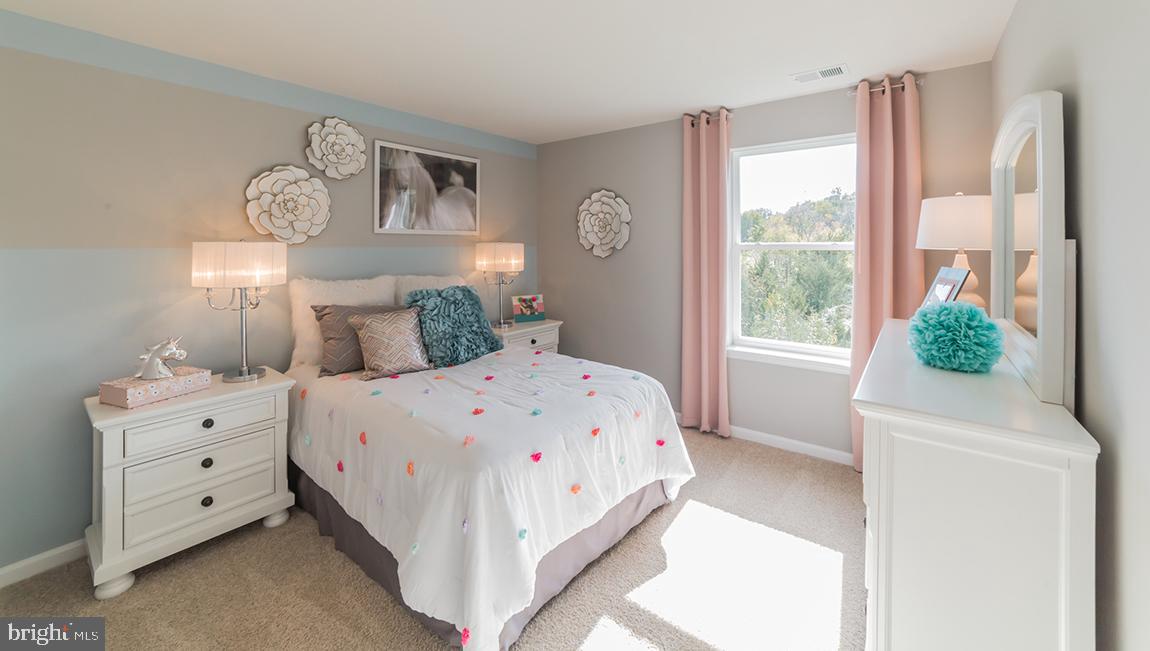 10 Moro Road Egg Harbor Township, NJ 08234 - Photo 21 of 42 a bedroom with a bed and a window