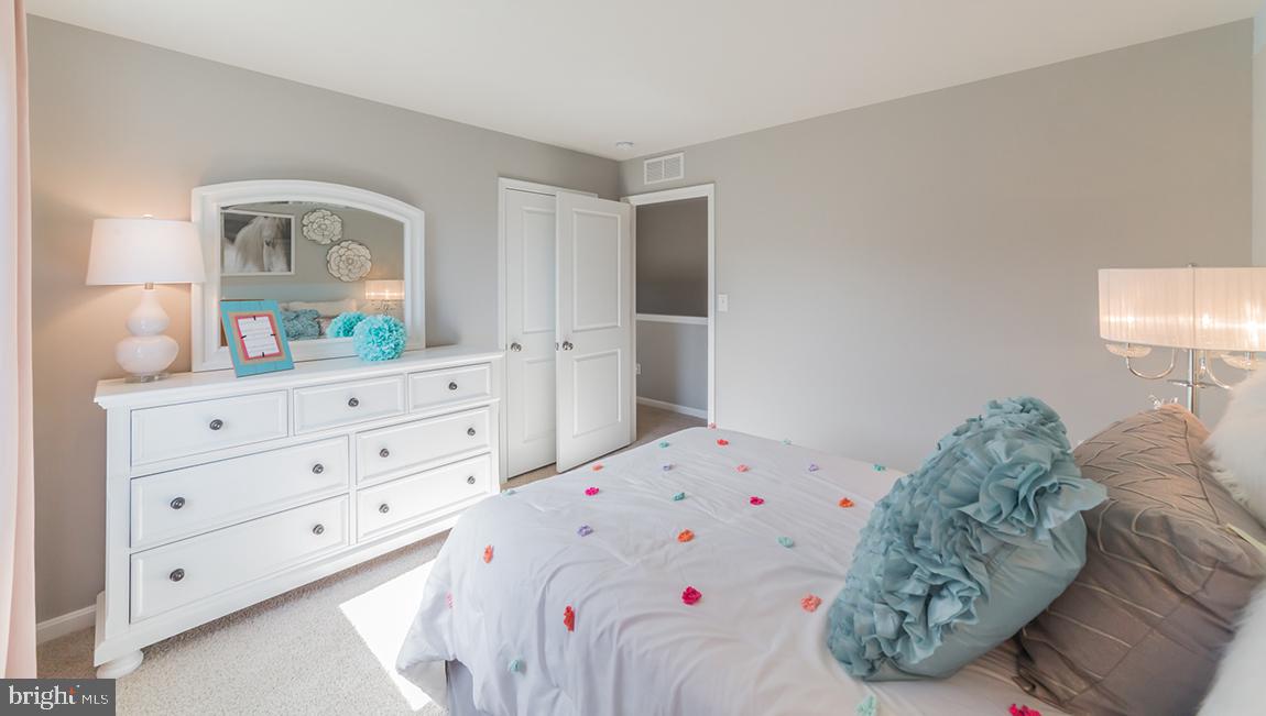 10 Moro Road Egg Harbor Township, NJ 08234 - Photo 22 of 42 a bedroom with a bed and a dresser in it