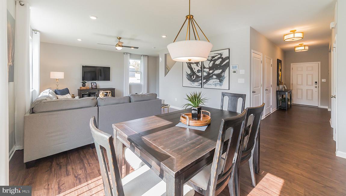 10 Moro Road Egg Harbor Township, NJ 08234 - Photo 9 of 42 a view of a dining room with furniture and wooden floor