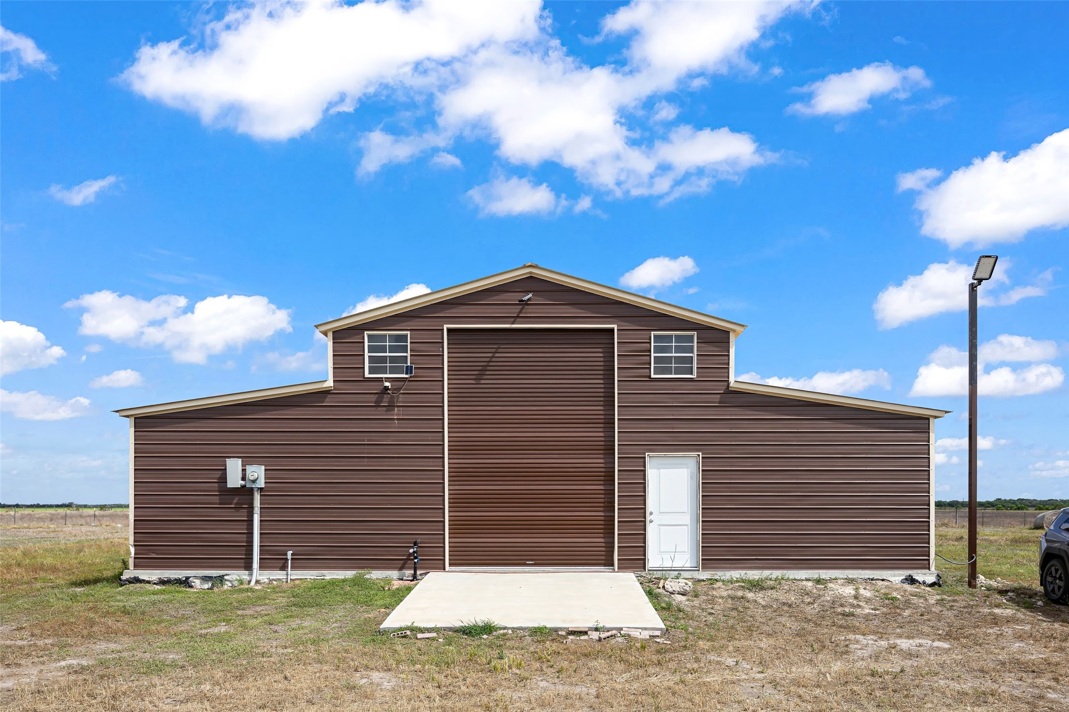 9690 Fm 1300 Road Louise, TX 77455 - Photo 2 of 11 a front view of a house with a garage