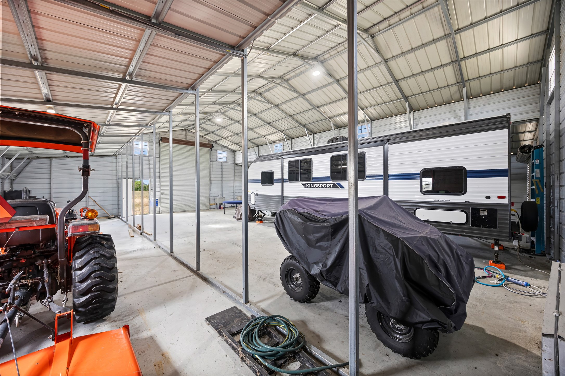 9690 Fm 1300 Road Louise, TX 77455 - Photo 4 of 11 a view of a room with gym equipment
