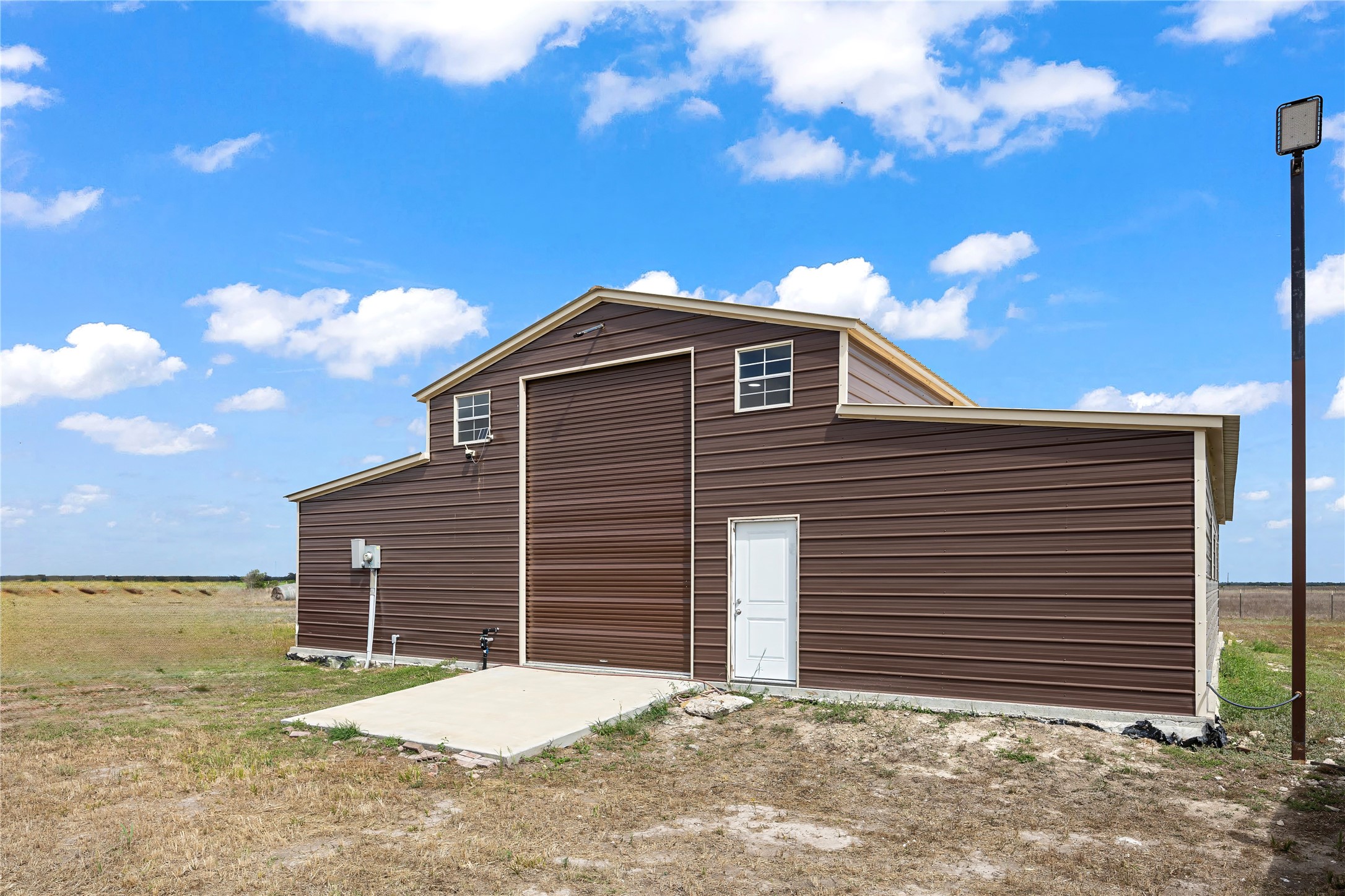 9690 Fm 1300 Road Louise, TX 77455 - Photo 6 of 11 a front view of a house with a yard